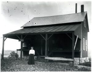Tinmouth Creamery with unknown woman standing in front
